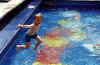 markjumpinginpooldisneycruise.jpg (78801 bytes)